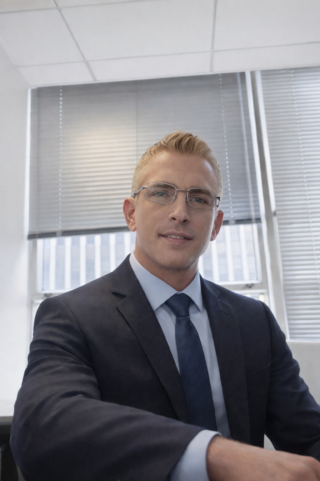 Kirk, Principal Consultant at KPadvantage.net LLC, seated in an executive office.